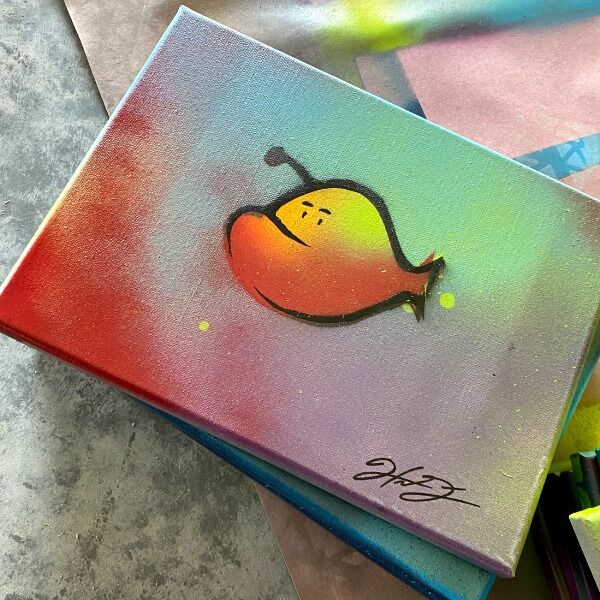 Year 5 of Hank's spray painting mastery! You'll get his signature Hanklerfish spray painted on a medium sized stretched canvas.