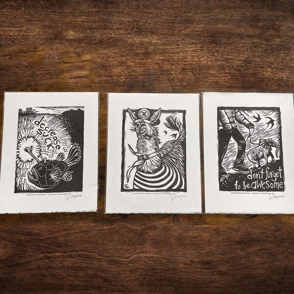 Get a fancy woodblock print from Claire Emery featuring a Hanklerfish, a French Llama, or a puppy sized elephant in black and white!