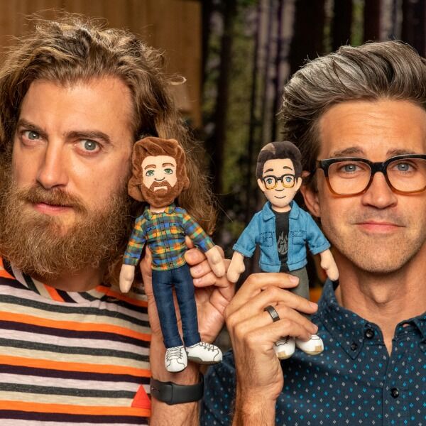A plushie version of Rhett and Link signed by the real-life Rhett and Link!