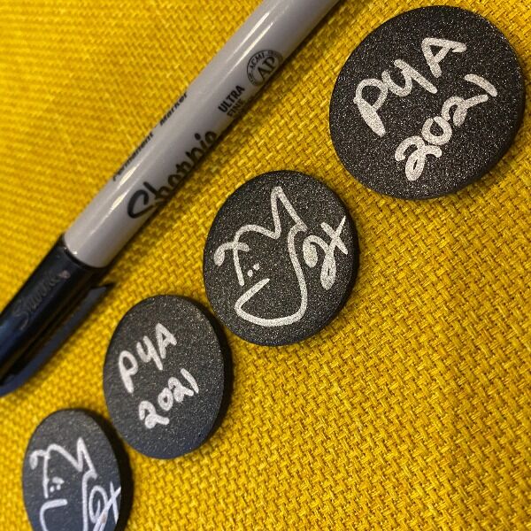 These little discs of foam were left over from the creation of the Crash Course Coin. Each one has a Hanklerfish and is marked "P4A 2022" (or possibly "P4A 2021", because Hank forgot about how dates work when he was making them.)