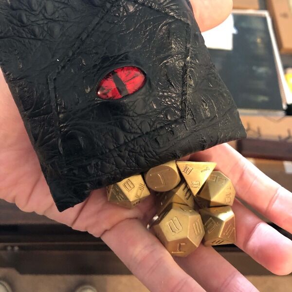 A specia dice set get gifted to the Dimension 20 cast when they wrapped Escape from the Bloodkeep! Signed by Brennan Lee Mulligan