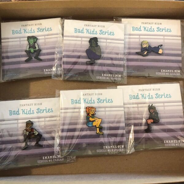 Are you a bad kid? You need a bad kid pin from Dimension 20, featuring one of the bad students from the Aguefort Adventuring Academy. Signed by Dimension 20 cast members.