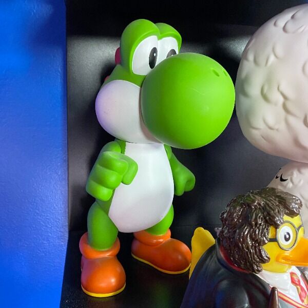 Get a signed prop from the Super Carlin Bros set! This cute figurine is of the untoppable Yoshi from the Carlin Bro's namesake, Super Mario Bros! Get a signed prop from the Super Carlin Bros set! This cute figurine is of the untoppable Yoshi from the Carlin Bro's namesake, Super Mario Bros!