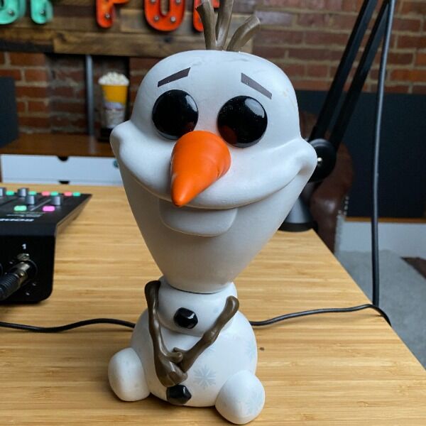 Get a signed prop from the Super Carlin Bros set! This Olaf figurine is sure to melt your heart! Get a signed prop from the Super Carlin Bros set! This Olaf figurine is sure to melt your heart!